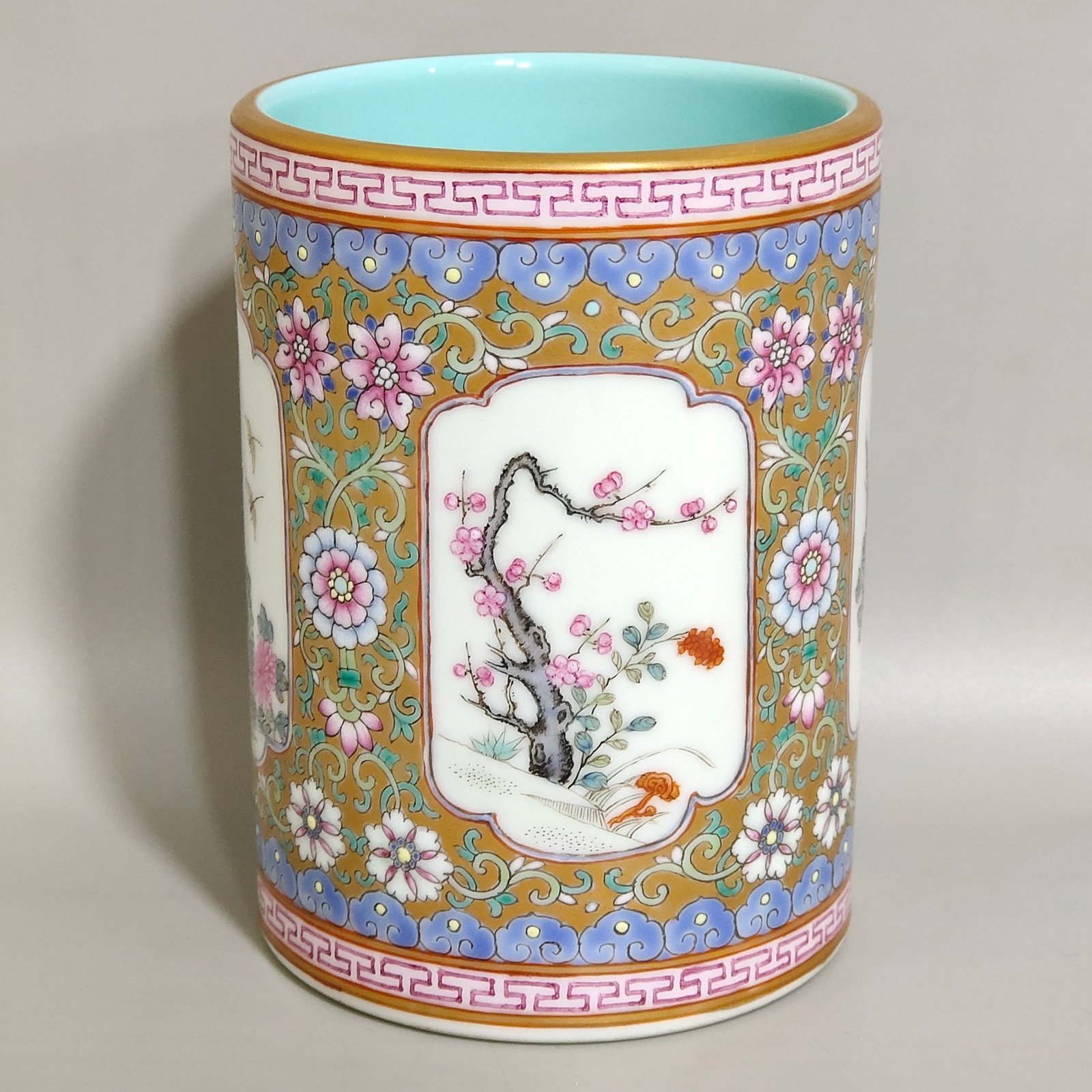 Qing Dynasty Qianlong a windowed four-season flower brush holder