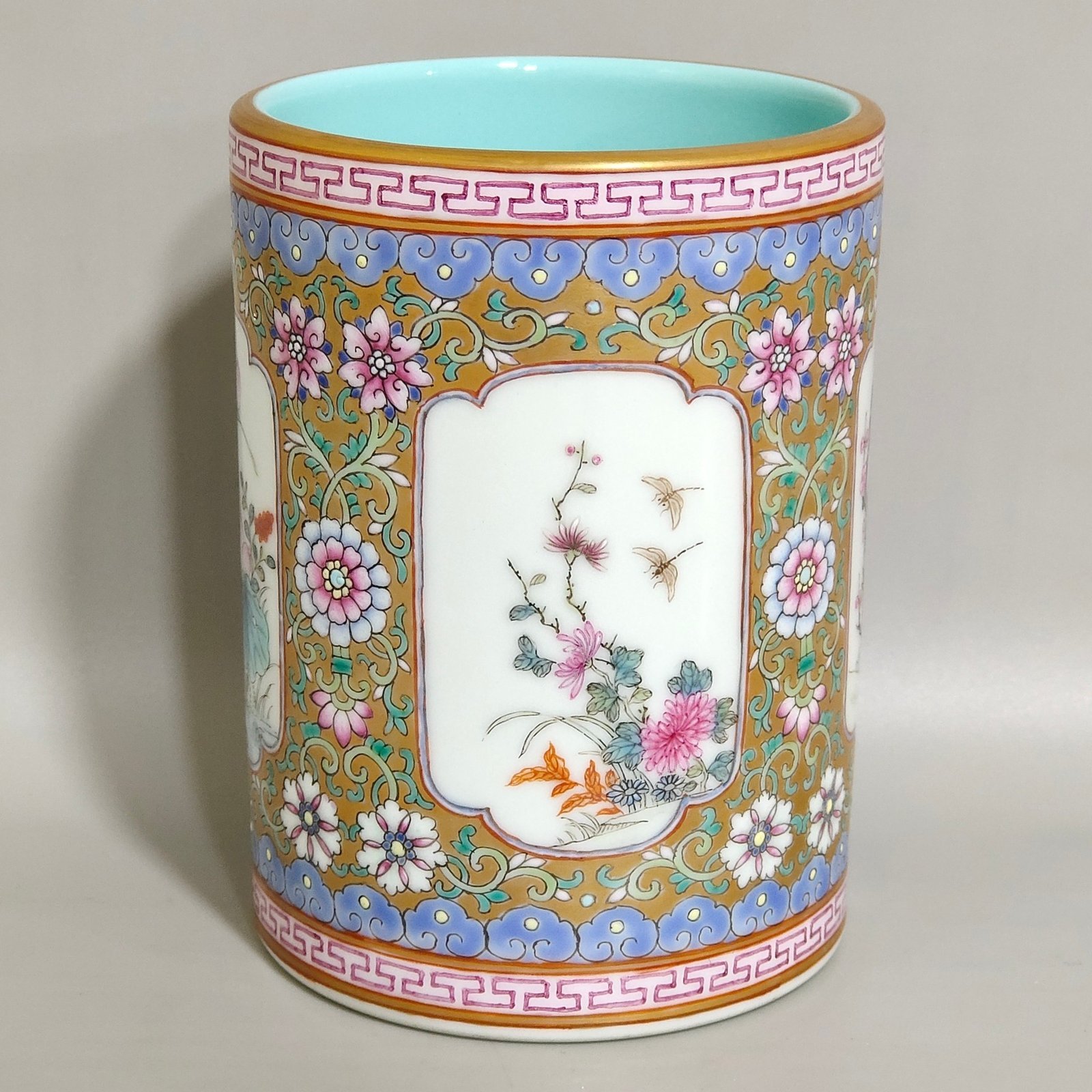Qing Dynasty Qianlong a windowed four-season flower brush holder