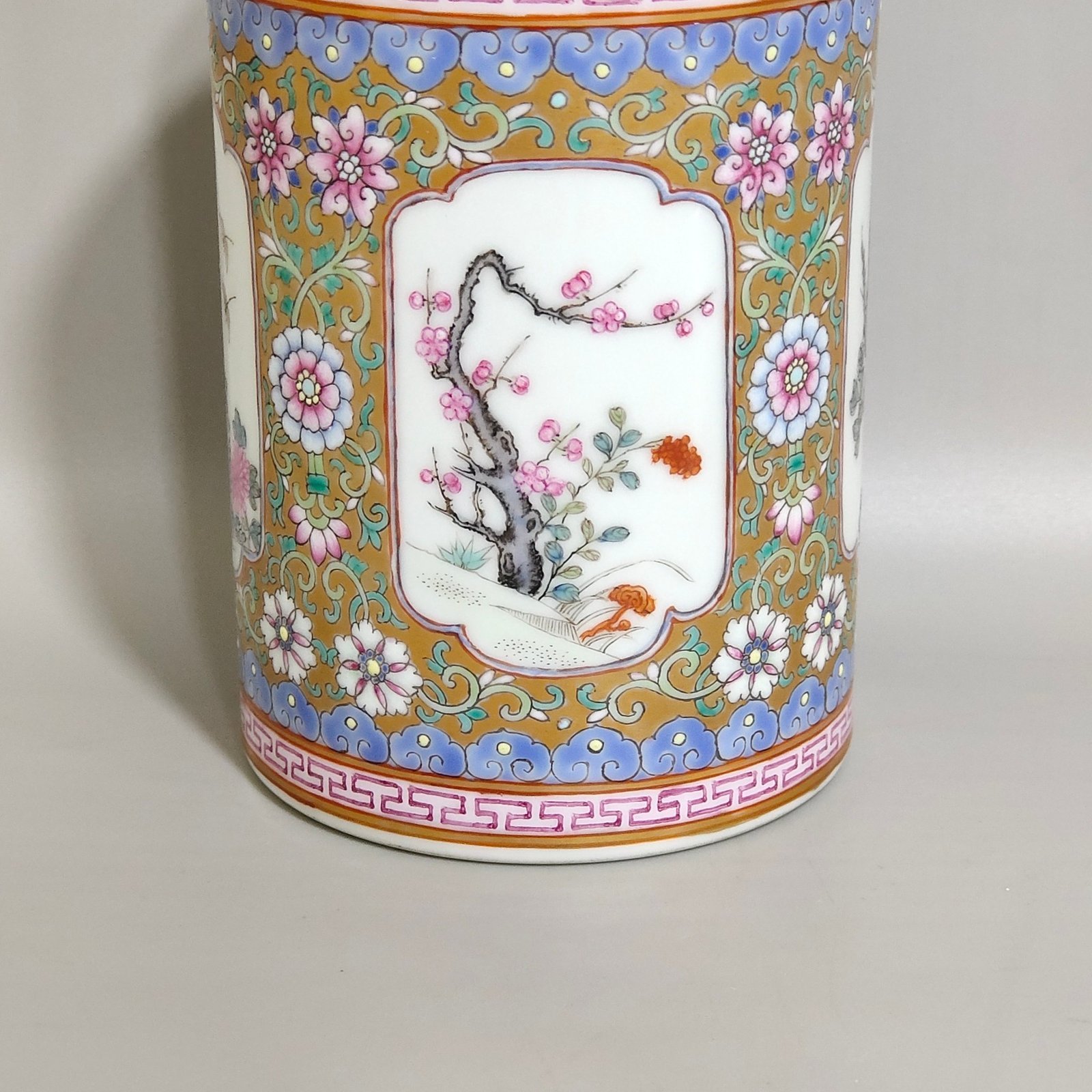 Qing Dynasty Qianlong a windowed four-season flower brush holder