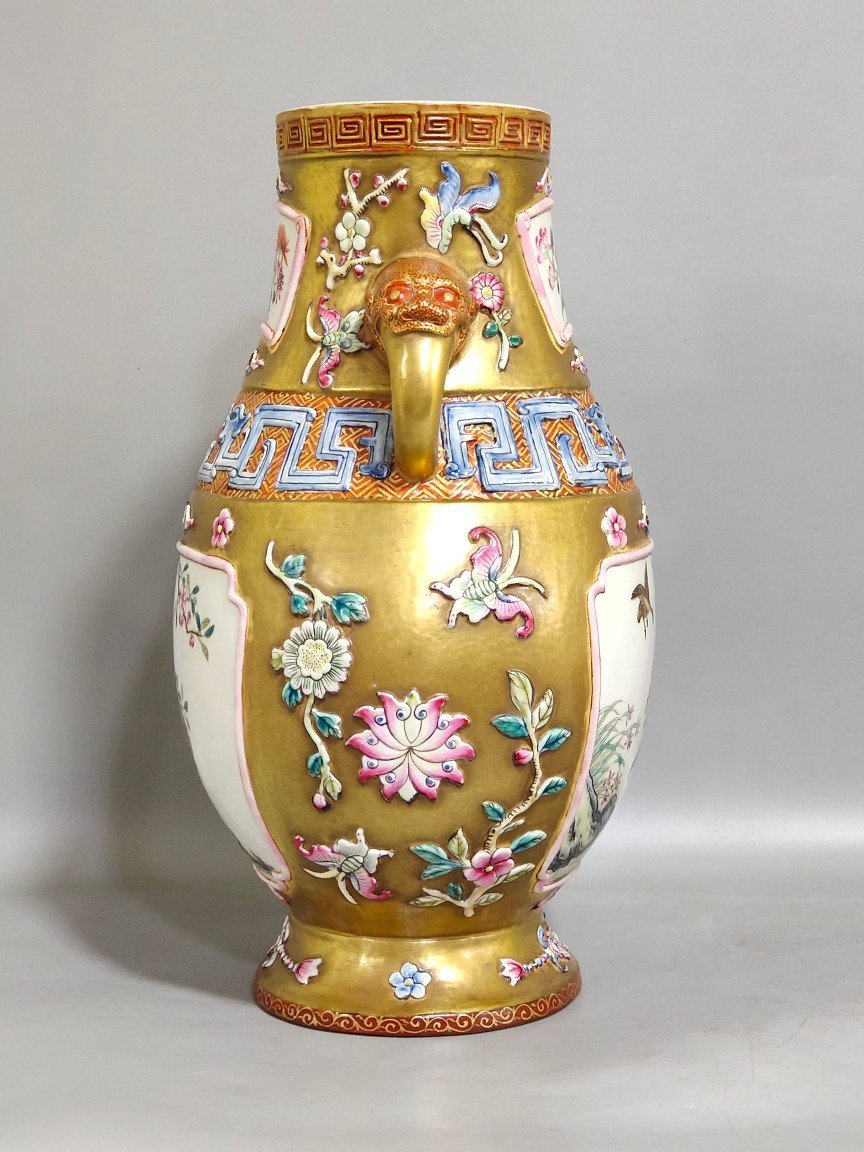 Qing Dynasty Qianlong a gold-plated windowed quail reed wild goose and elephant ear vase