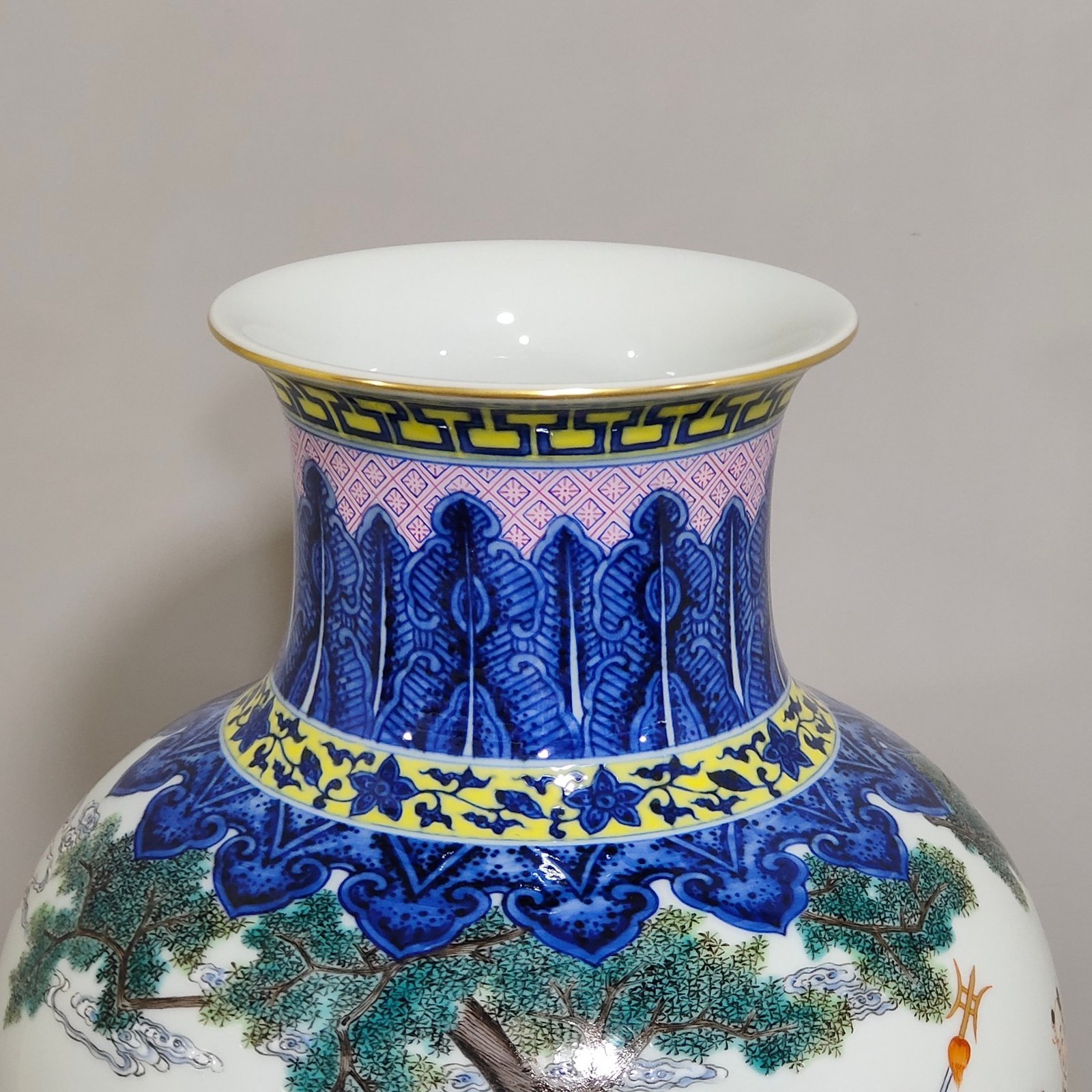 Qing Dynasty Qianlong blue and white and pastel figure boy vase