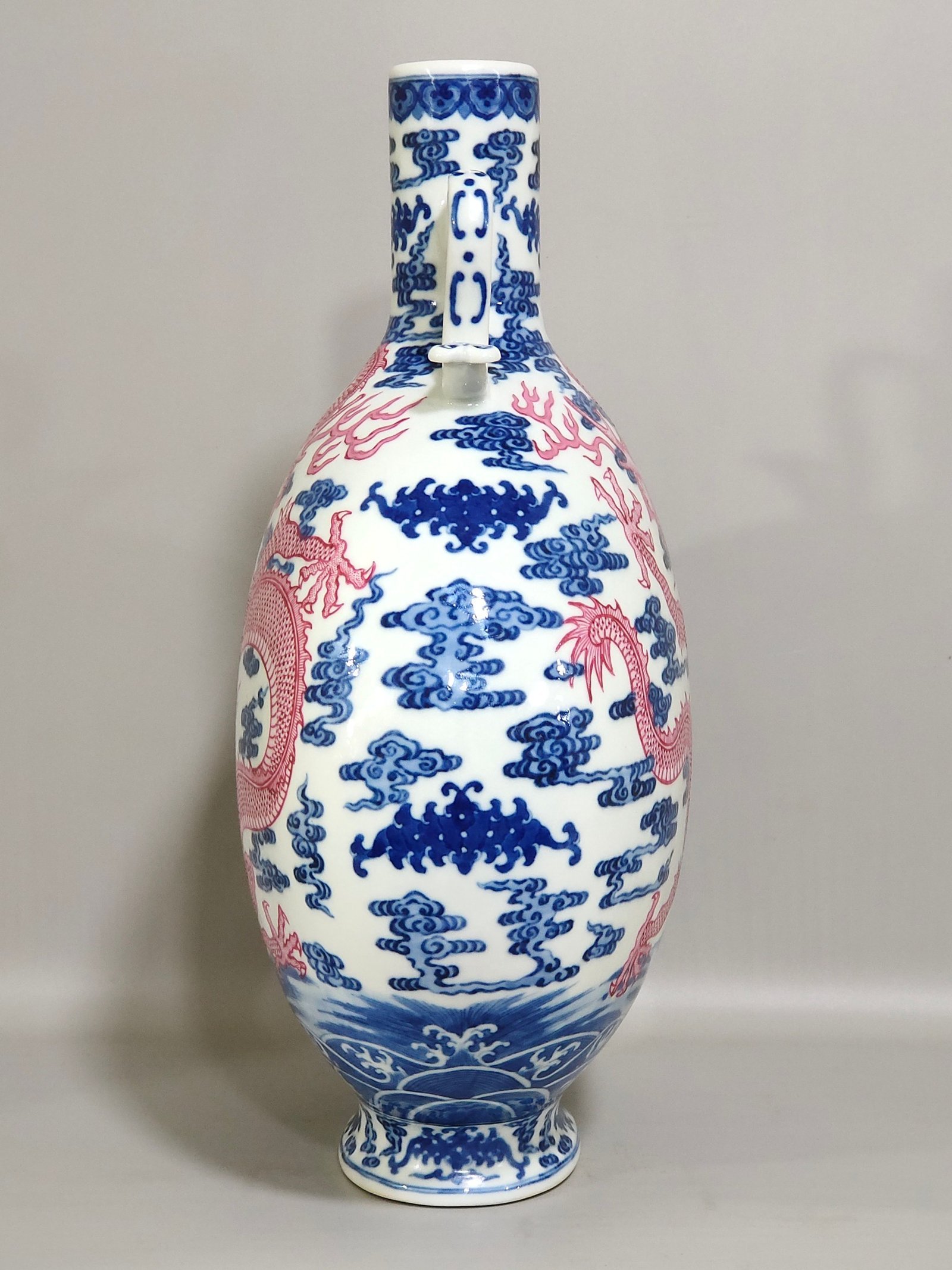 Qing Dynasty Qianlong blue and white and rouge red auspicious cloud and dragon pattern moon-holding vase