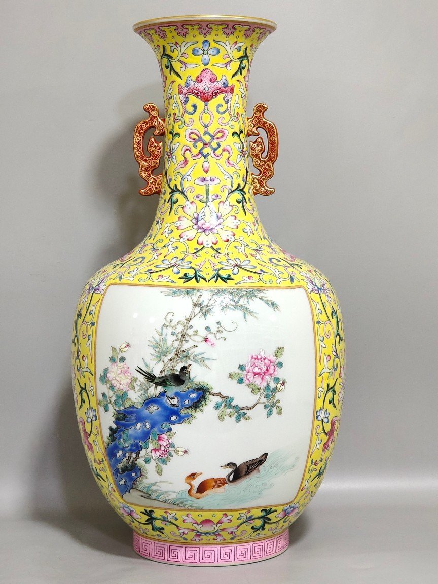 Qing Dynasty Qianlong yellow ground flower and bird amphorae with windows