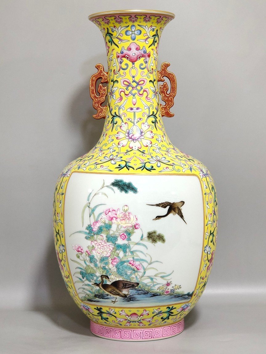 Qing Dynasty Qianlong yellow ground flower and bird amphorae with windows