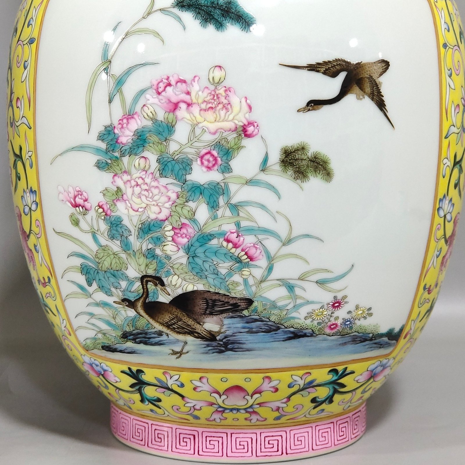 Qing Dynasty Qianlong yellow ground flower and bird amphorae with windows