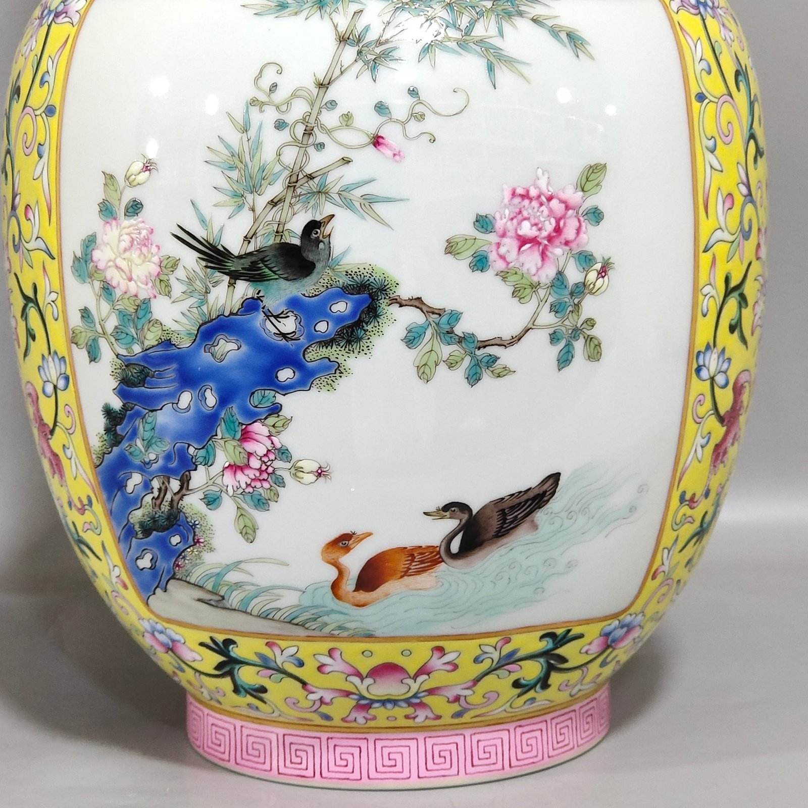 Qing Dynasty Qianlong yellow ground flower and bird amphorae with windows