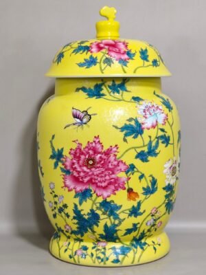 Qing Dynasty Qianlong a yellow-glazed poppy-covered jar with a poem and a flower cover