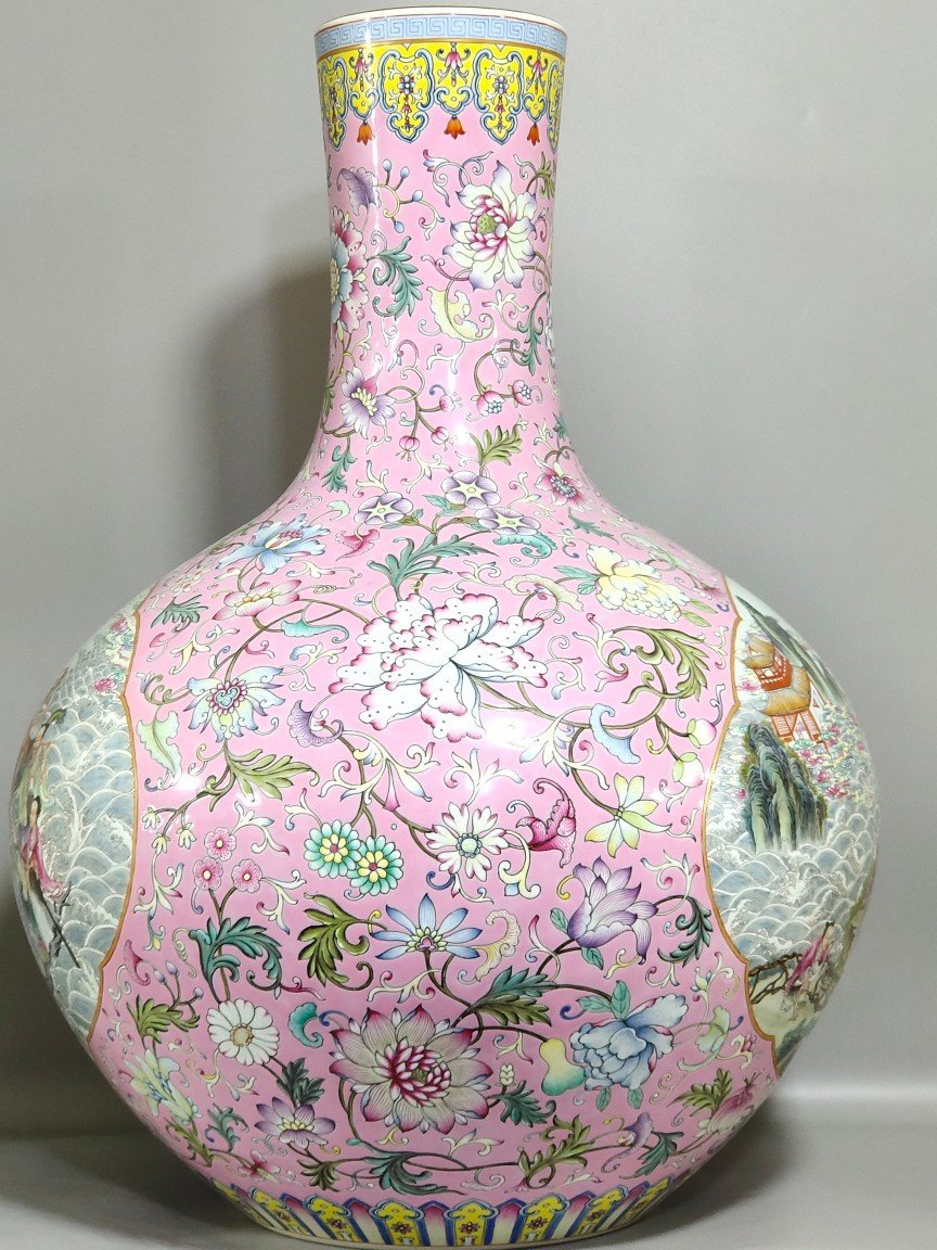 Qing Dynasty Yongzheng celestial sphere vase with pink ground flowers and windows