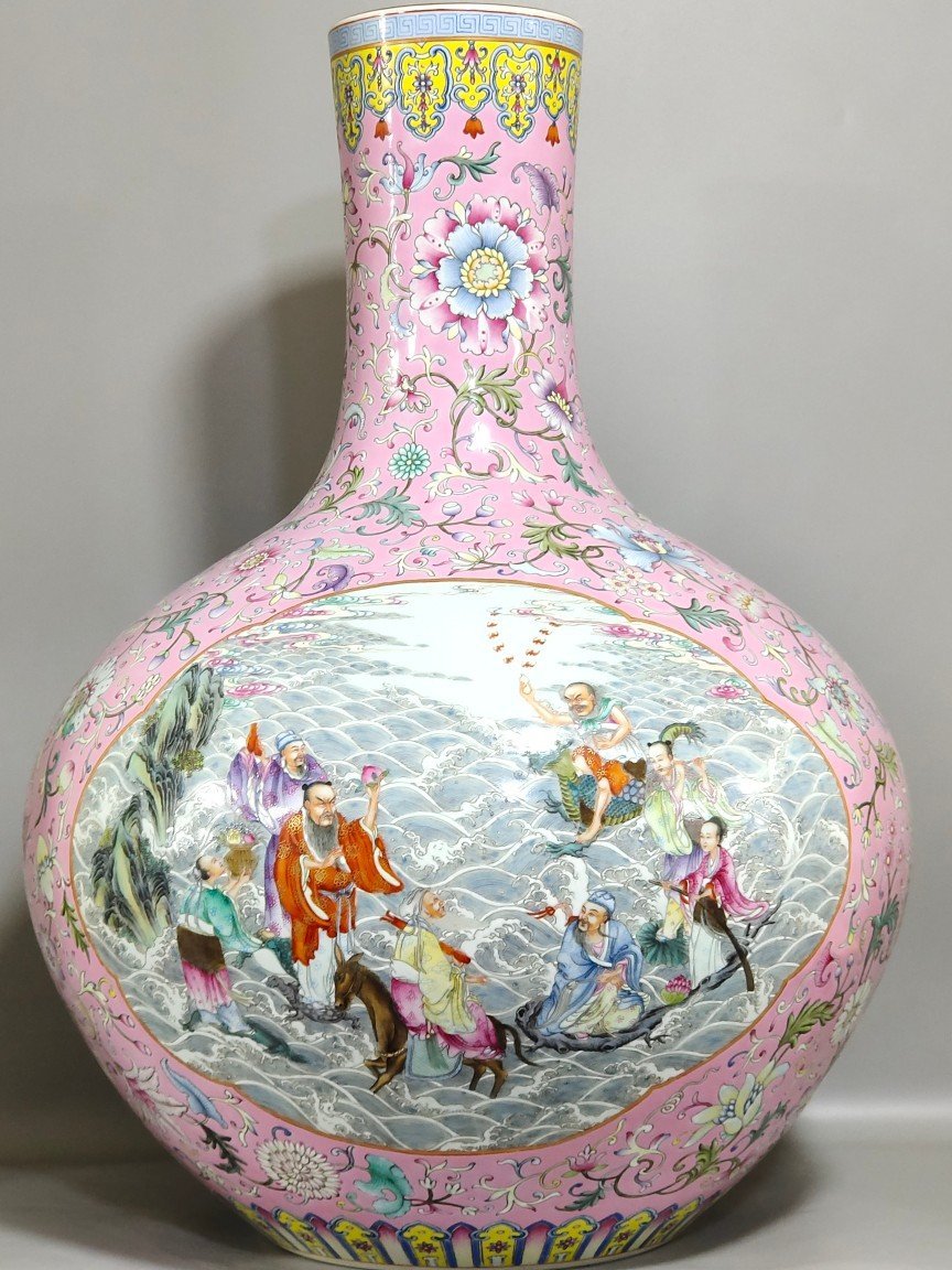 Qing Dynasty Yongzheng celestial sphere vase with pink ground flowers and windows