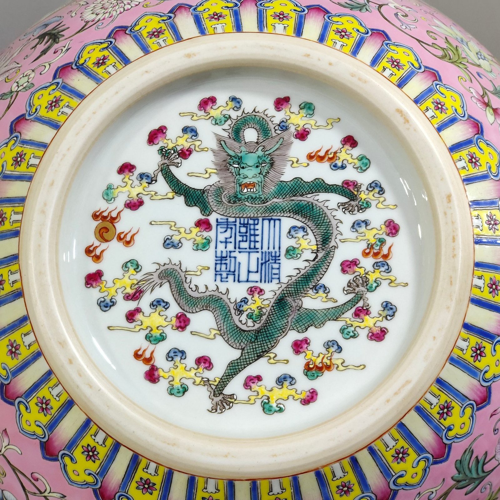 Qing Dynasty Yongzheng celestial sphere vase with pink ground flowers and windows
