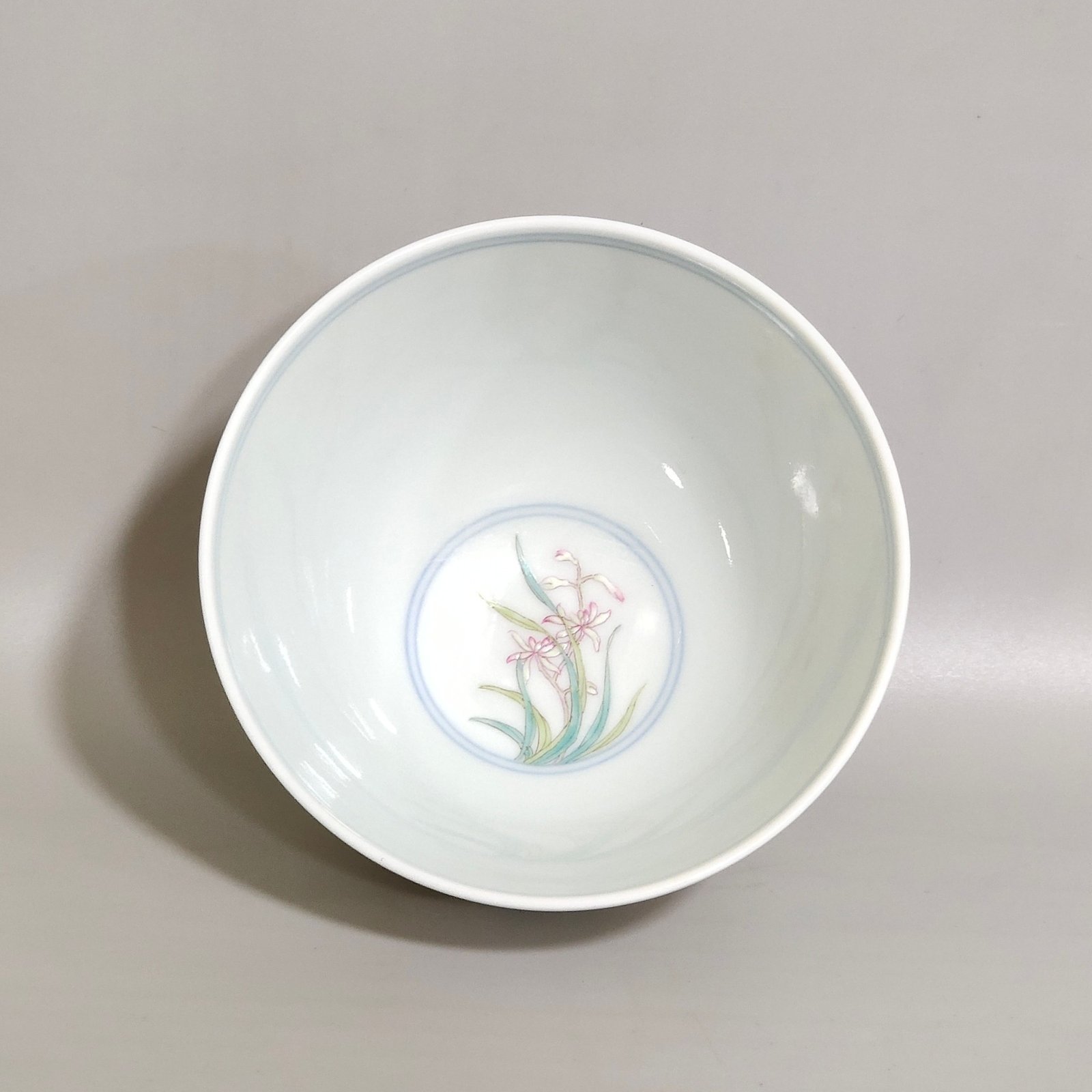 Qing Dynasty Yongzheng orchid-painted chicken heart cup
