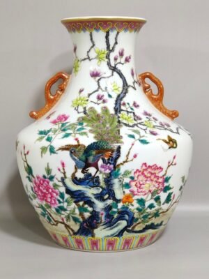 Qing Dynasty Yongzheng peacock double-eared statue