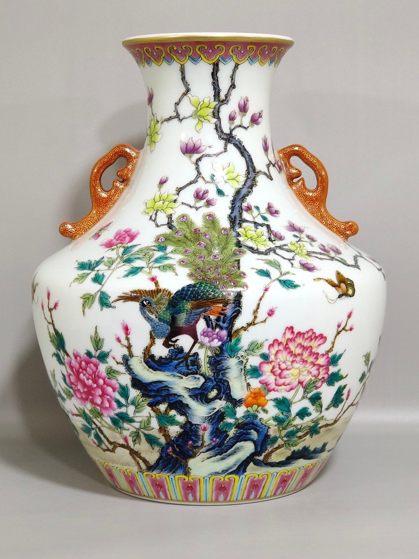 Qing Dynasty Yongzheng peacock double-eared statue