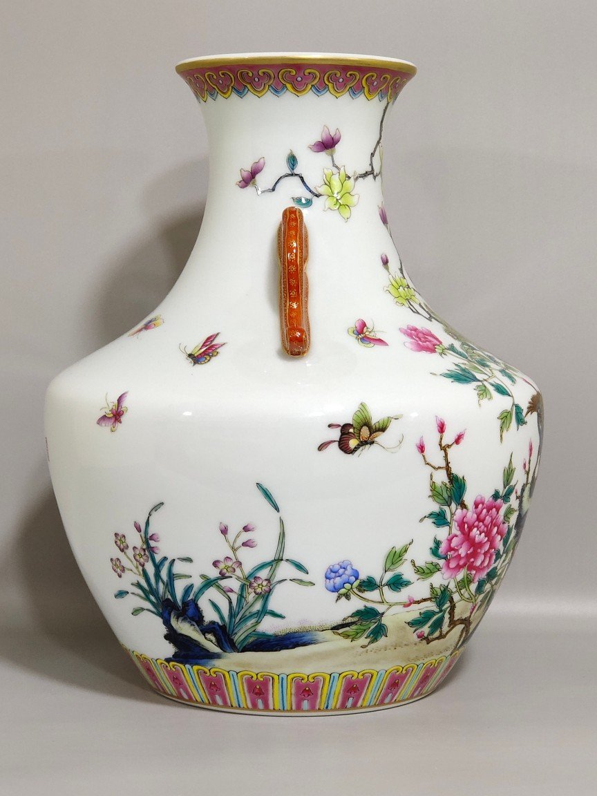 Qing Dynasty Yongzheng peacock double-eared statue