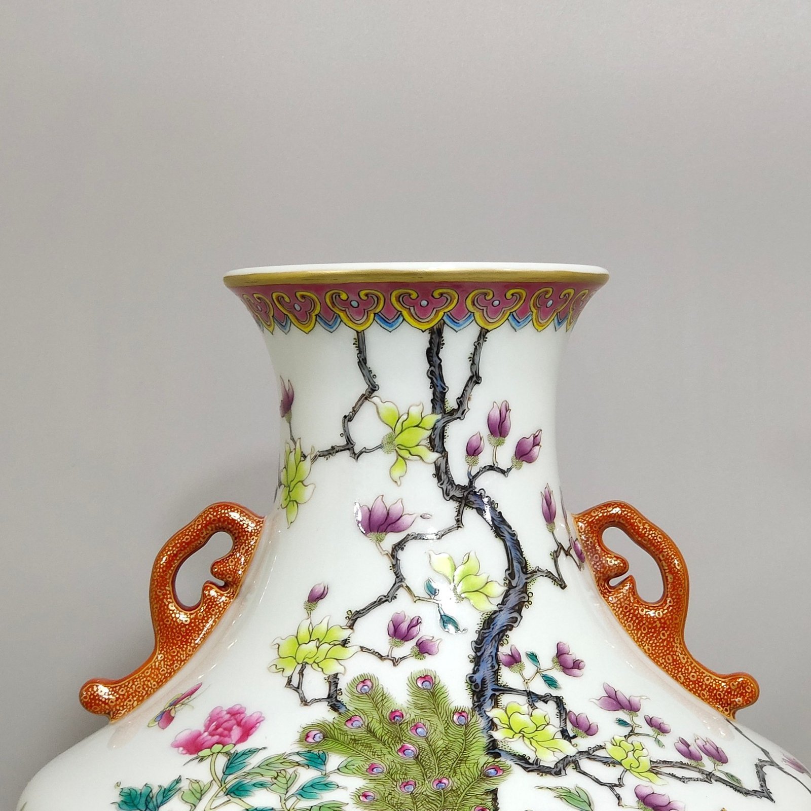 Qing Dynasty Yongzheng peacock double-eared statue