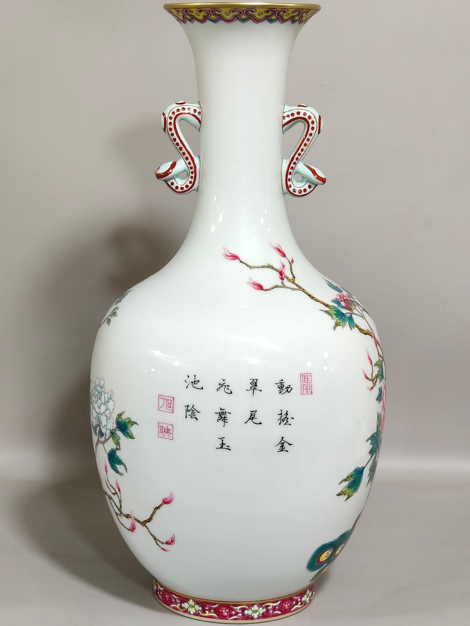 Qing Dynasty Yongzheng peacock vase with open tail and two ears inscribed with poetry