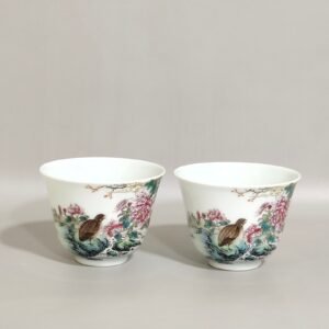 Qing Dynasty Yongzheng cup inscribed with poems about living and working in peace