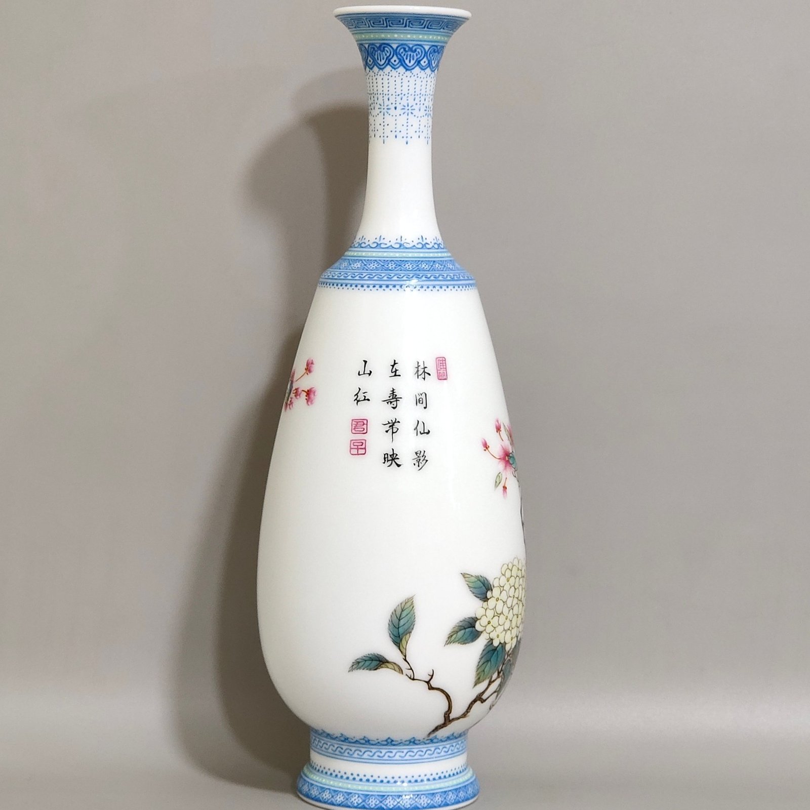 Qing Dynasty Yongzheng enamel vase with green edging and poems inscribed with flowers and birds