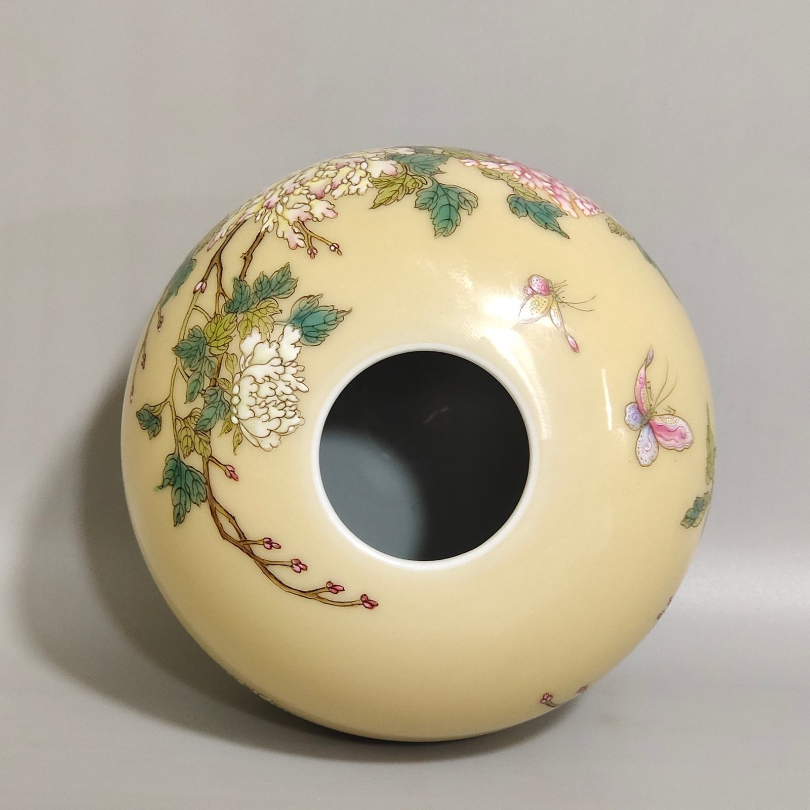Qing Dynasty Yongzheng Beige-glazed peony butterfly bowl