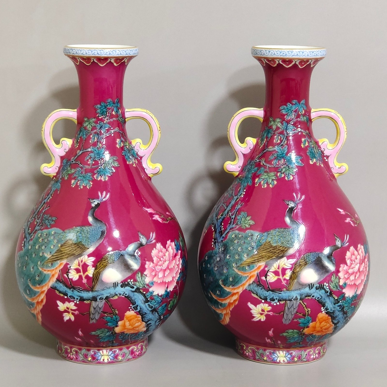 Qing Dynasty Yongzheng A rouge-red peacock with double-eared jade vase