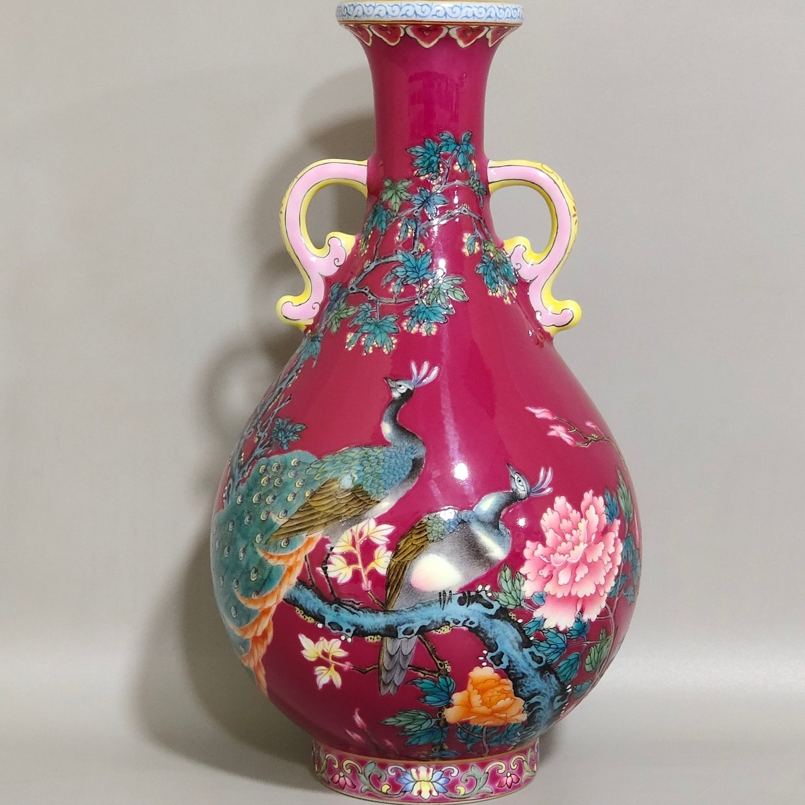 Qing Dynasty Yongzheng A rouge-red peacock with double-eared jade vase