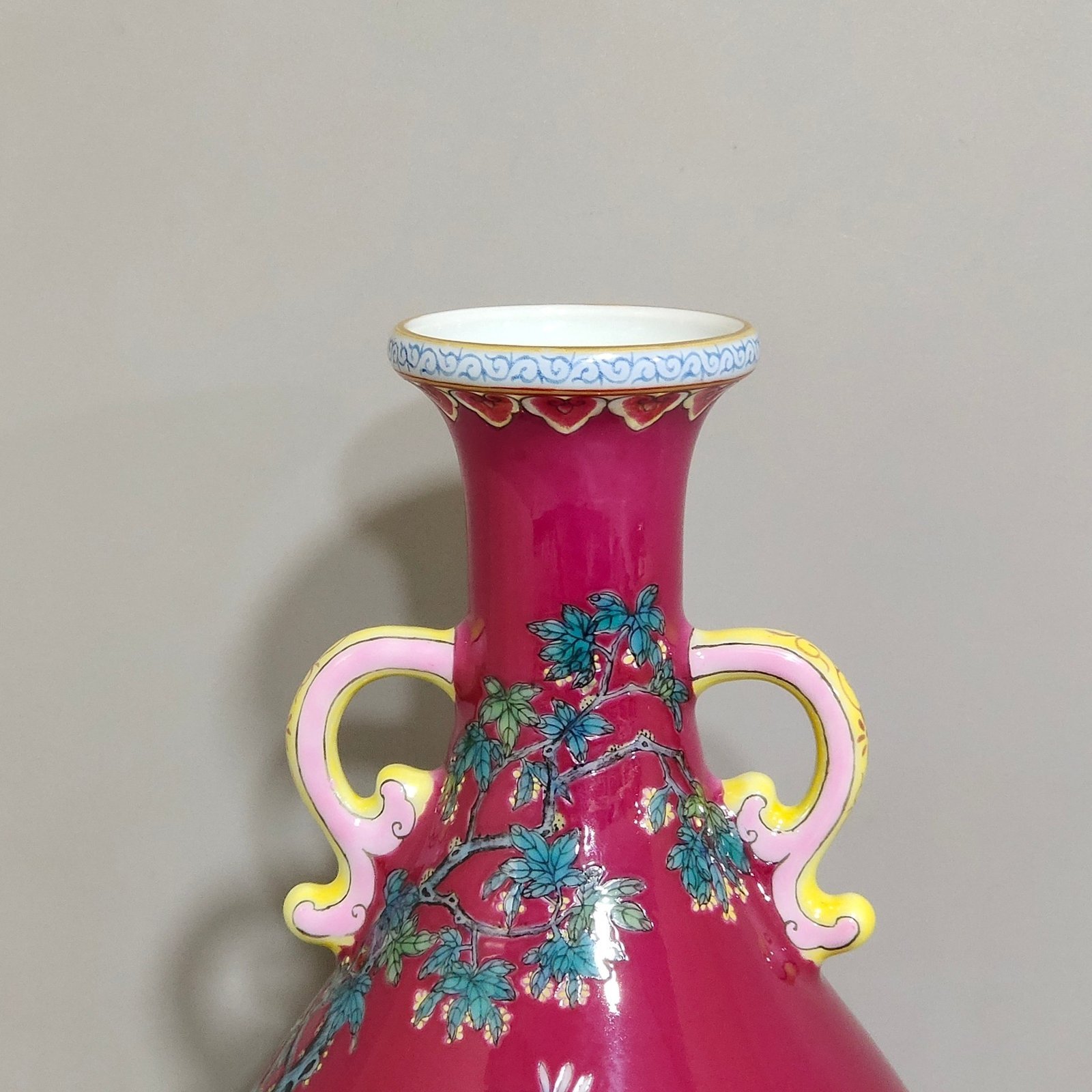Qing Dynasty Yongzheng A rouge-red peacock with double-eared jade vase