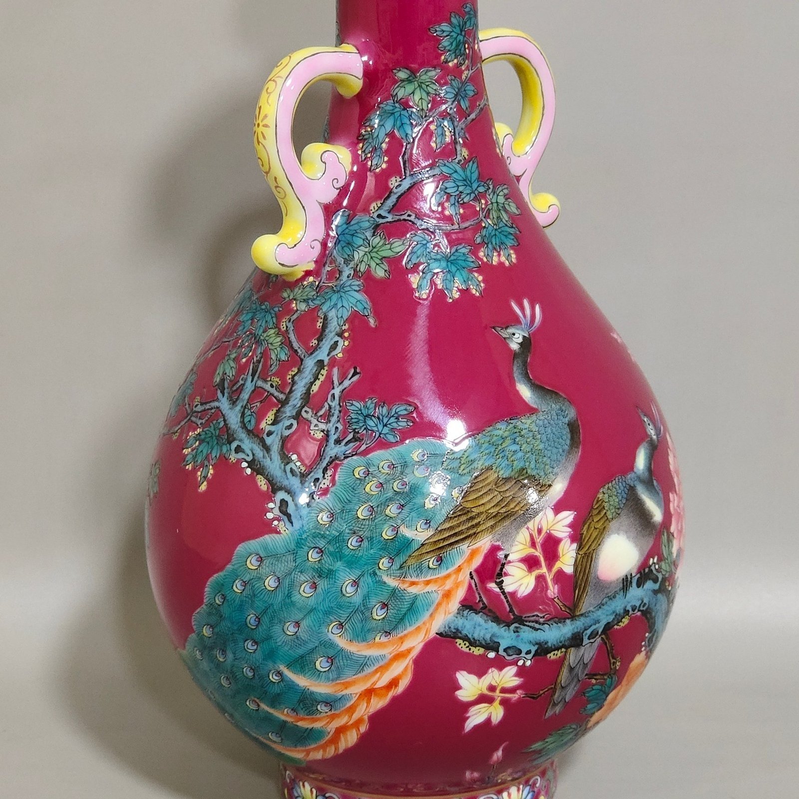 Qing Dynasty Yongzheng A rouge-red peacock with double-eared jade vase
