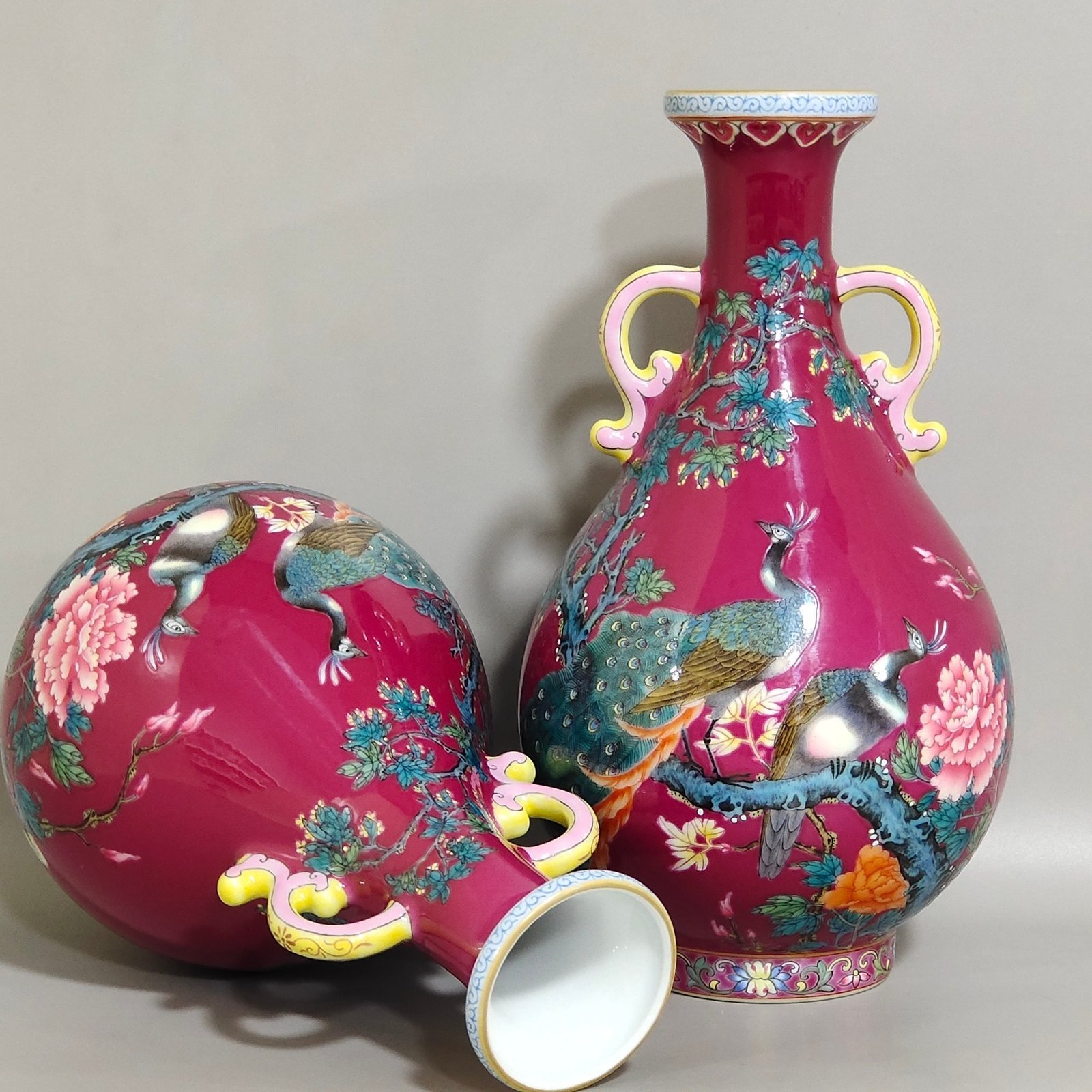 Qing Dynasty Yongzheng A rouge-red peacock with double-eared jade vase