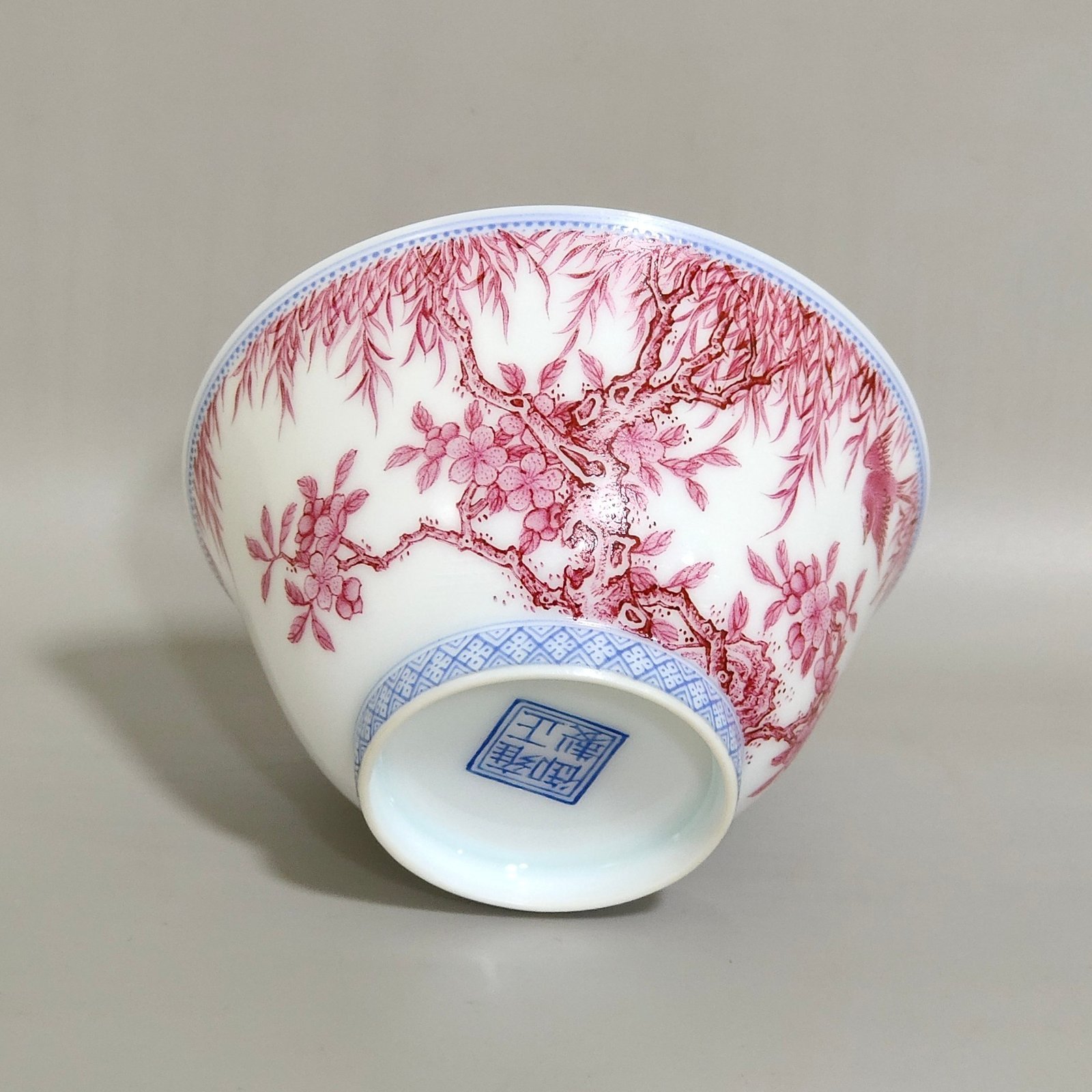 Qing Dynasty Yongzheng A rouge-red green-edged apricot-lined spring swallow-inscribed thin cup