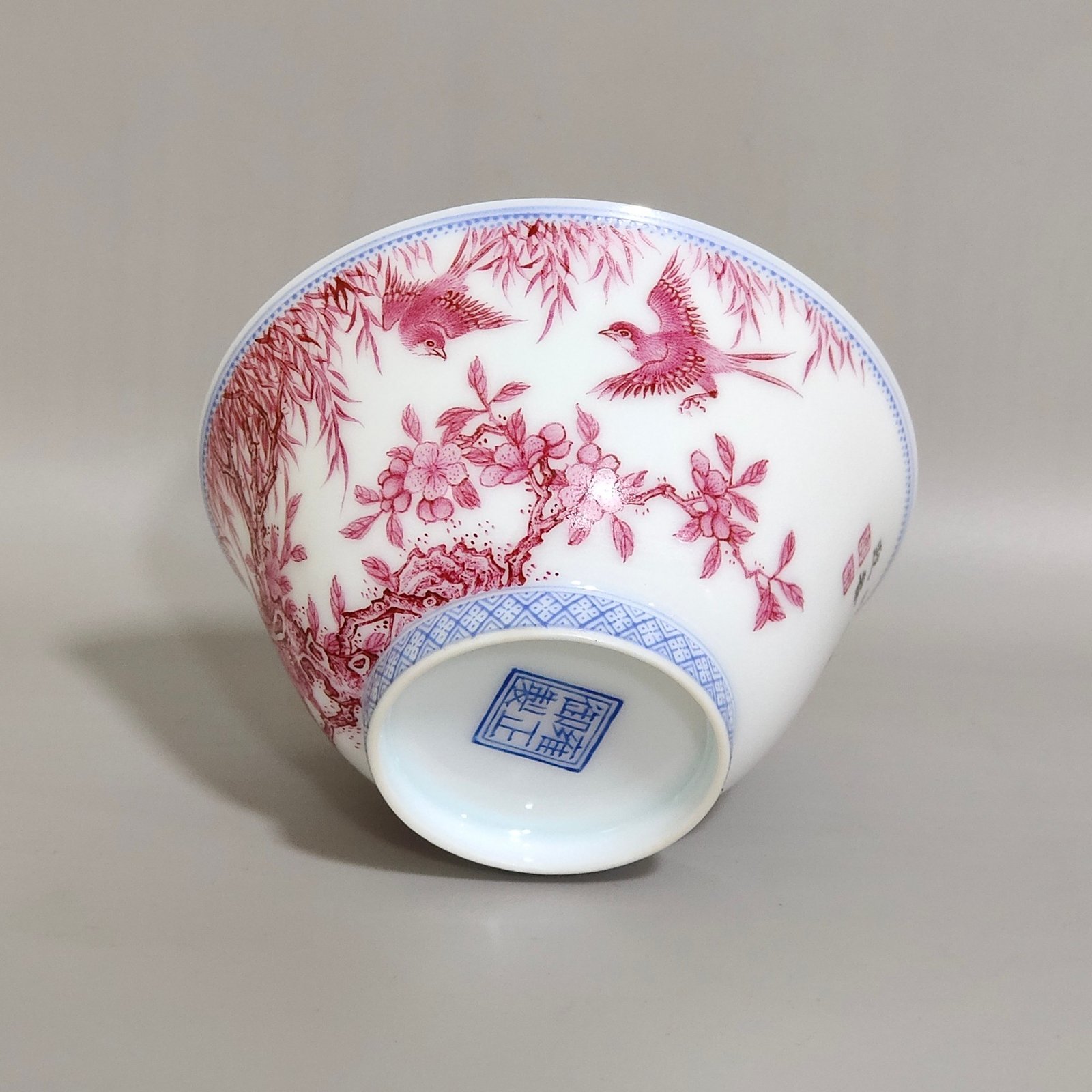 Qing Dynasty Yongzheng A rouge-red green-edged apricot-lined spring swallow-inscribed thin cup