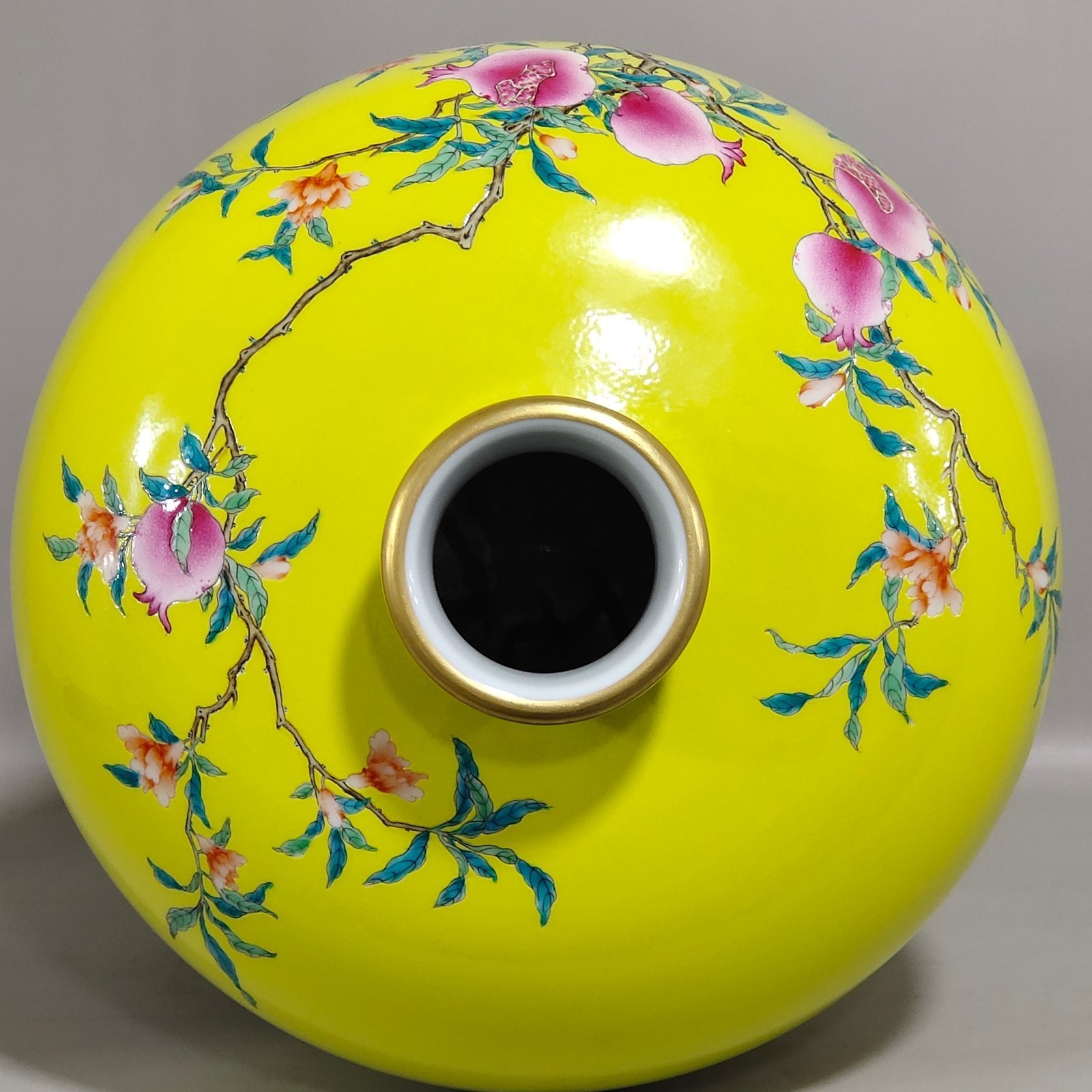 Qing Dynasty Yongzheng lemon yellow glaze flower and bird plum vase