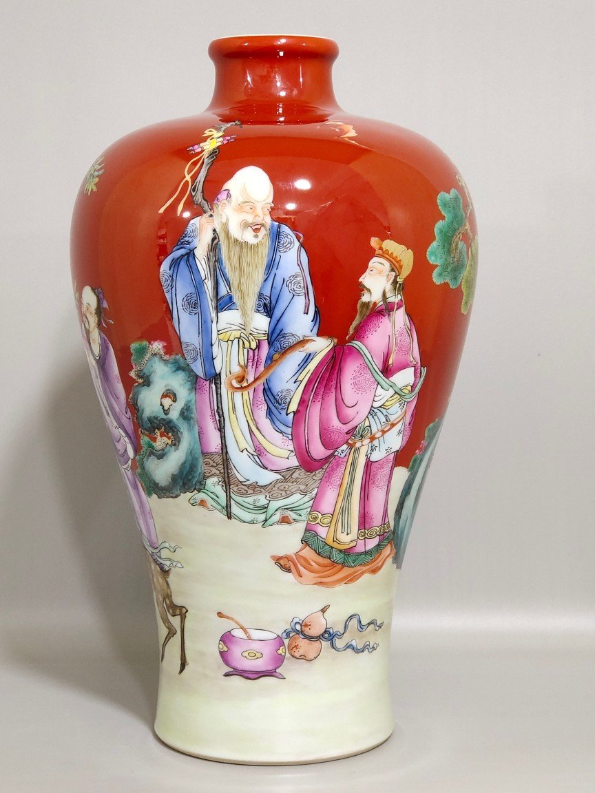 Qing Dynasty Yongzheng coral red three-star birthday celebration plum vase
