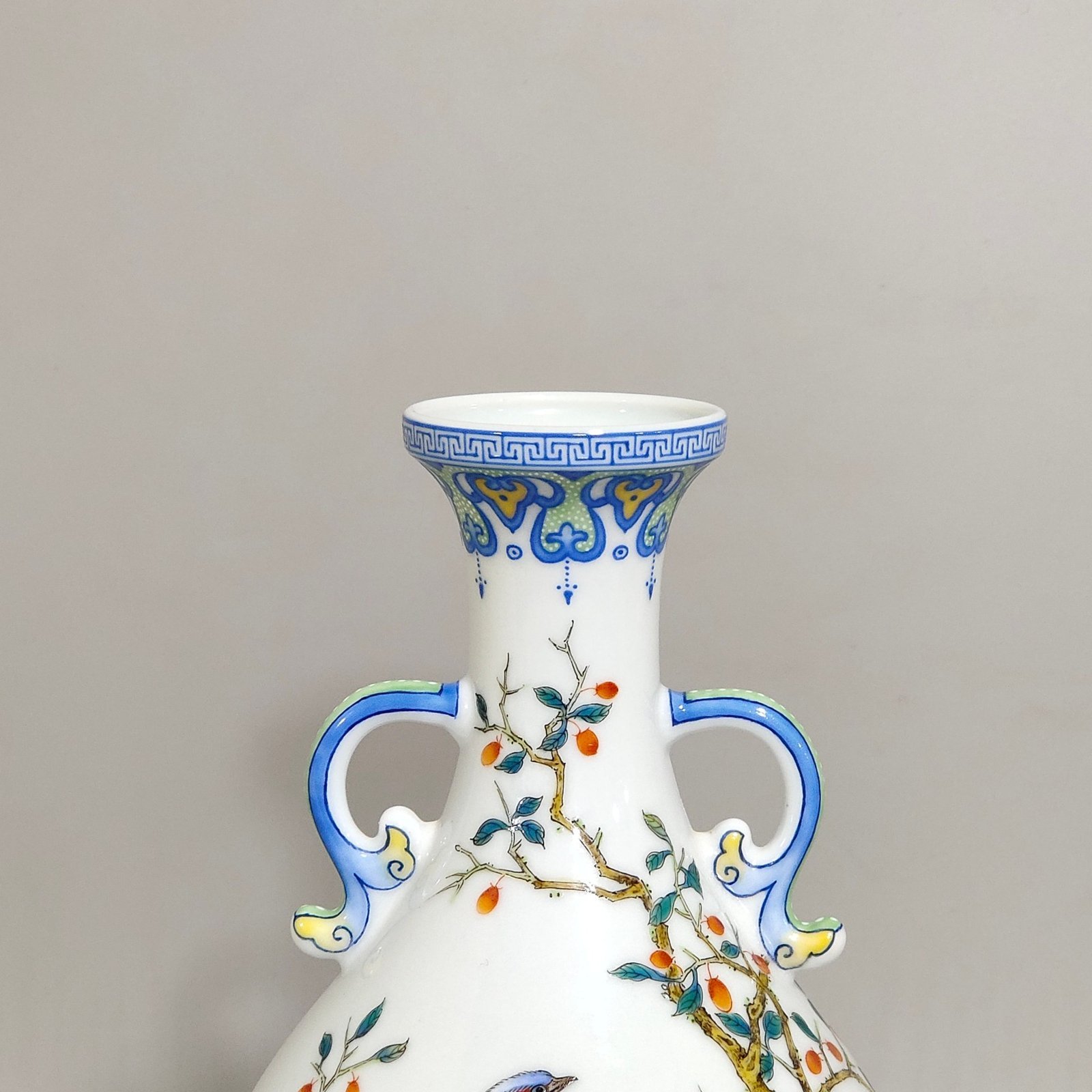 Qing Dynasty Yongzheng enamel colored jade rim with icing on the cake double-eared jade pot spring vase
