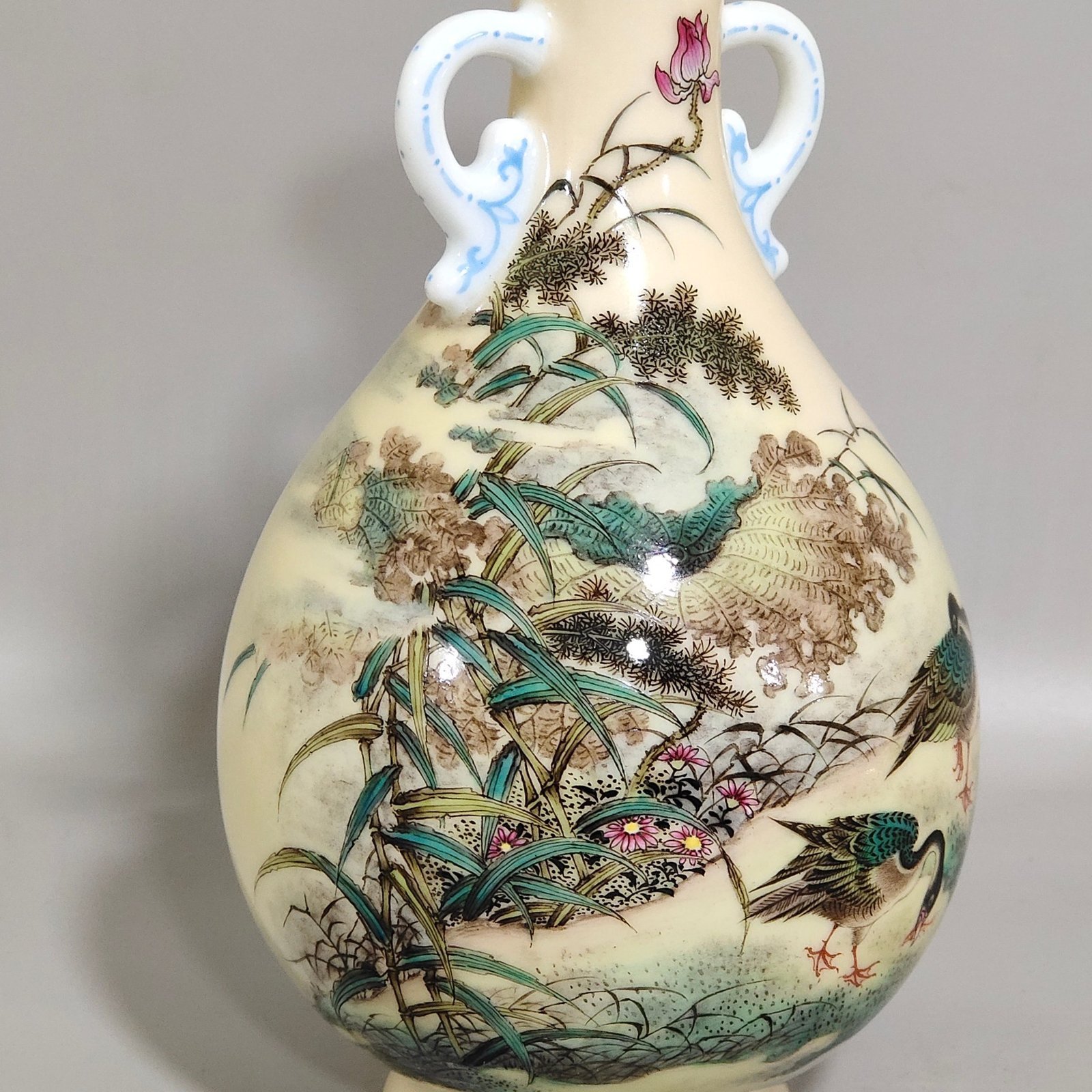 Qing Dynasty Yongzheng enamel yellow glaze double-eared jade pot spring vase