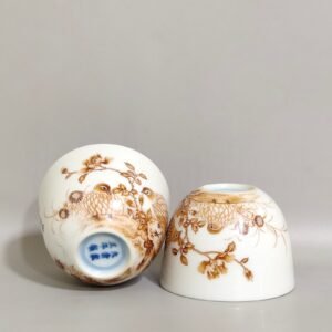 Qing Dynasty Yongzheng alum red cup inscribed with poems about living and working
