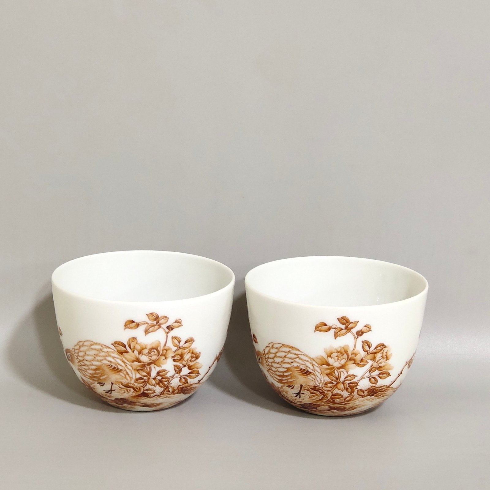 Qing Dynasty Yongzheng alum red cup inscribed with poems about living and working