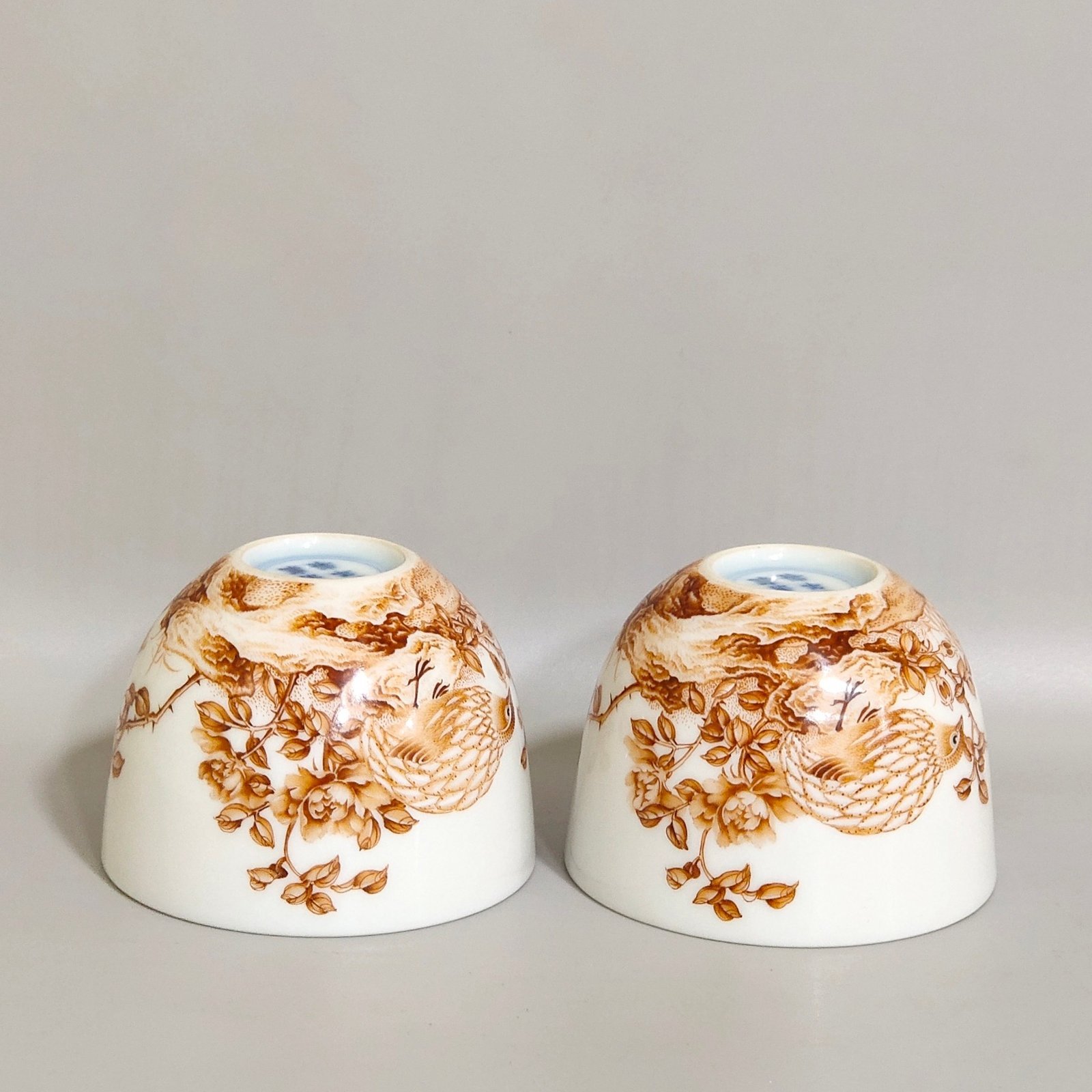 Qing Dynasty Yongzheng alum red cup inscribed with poems about living and working