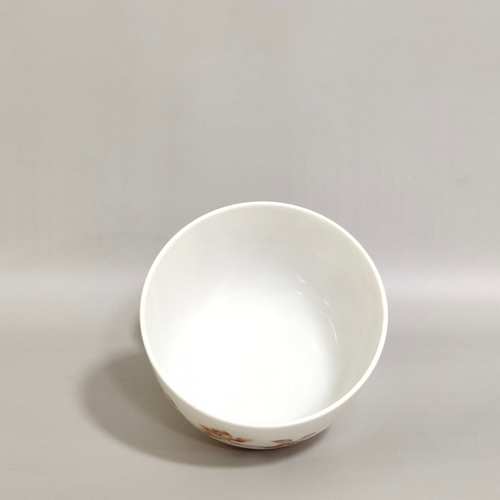 Qing Dynasty Yongzheng alum red cup inscribed with poems about living and working