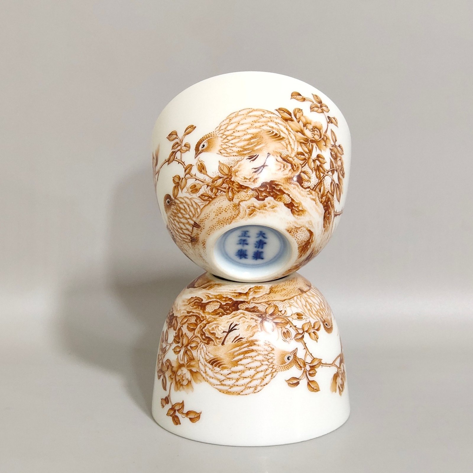 Qing Dynasty Yongzheng alum red cup inscribed with poems about living and working