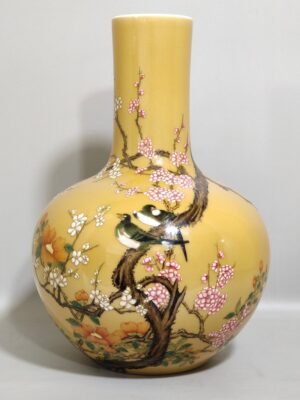 Qing Dynasty Yongzheng beige glazed flower and bird celestial sphere vase
