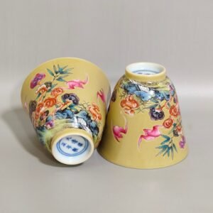 Qing Dynasty Yongzheng beige glazed bat cup with bamboo and stone patterns
