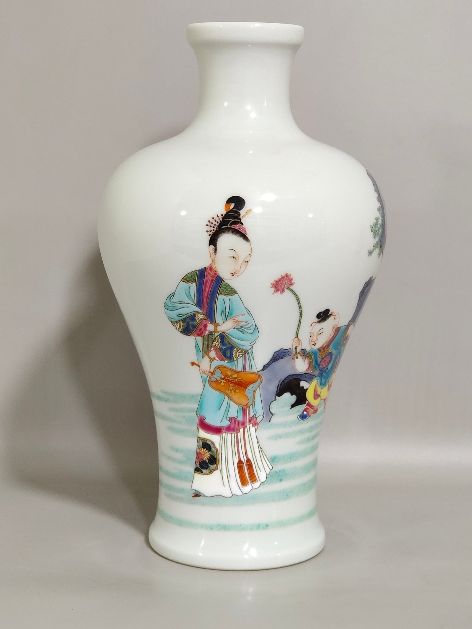 Qing Dynasty Yongzheng pastel plum vase depicting a lady playing with her baby