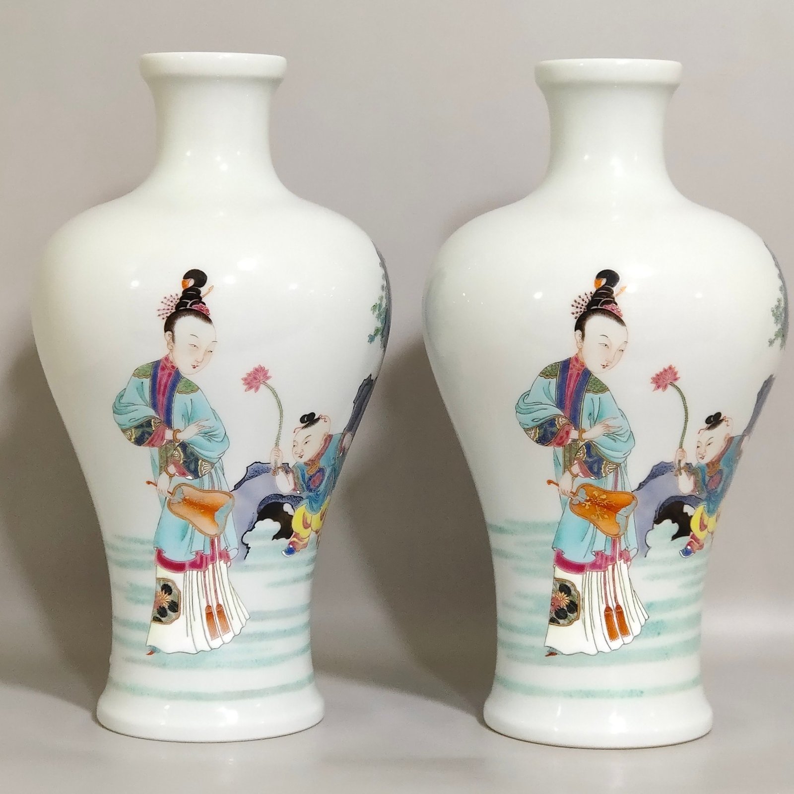 Qing Dynasty Yongzheng pastel plum vase depicting a lady playing with her baby