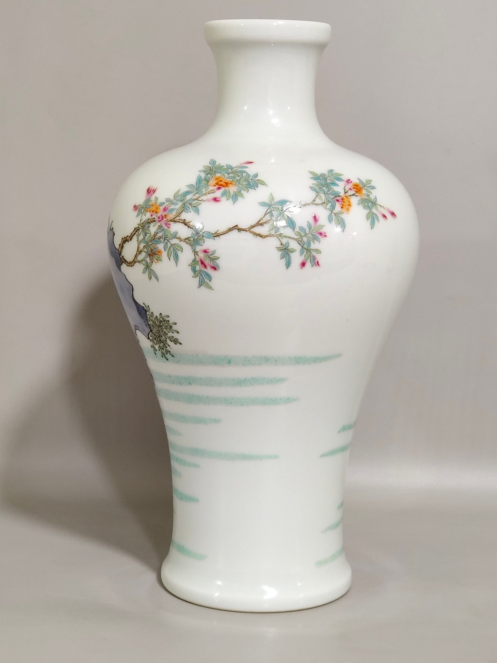 Qing Dynasty Yongzheng pastel plum vase depicting a lady playing with her baby