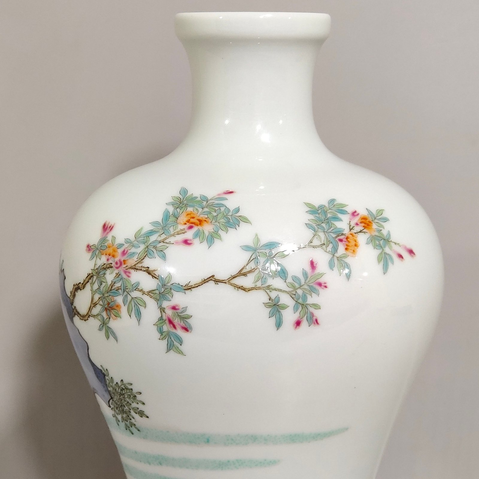 Qing Dynasty Yongzheng pastel plum vase depicting a lady playing with her baby