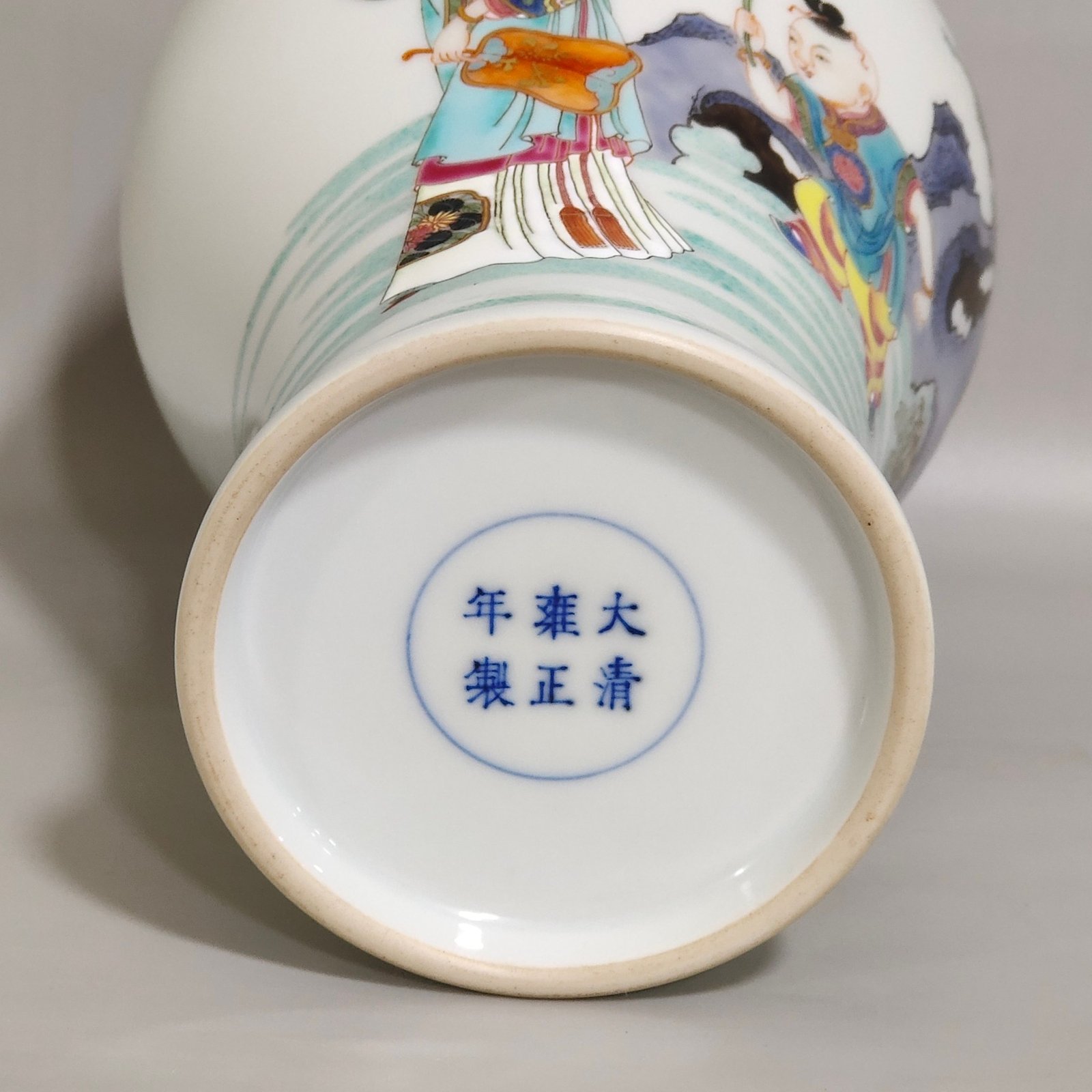 Qing Dynasty Yongzheng pastel plum vase depicting a lady playing with her baby