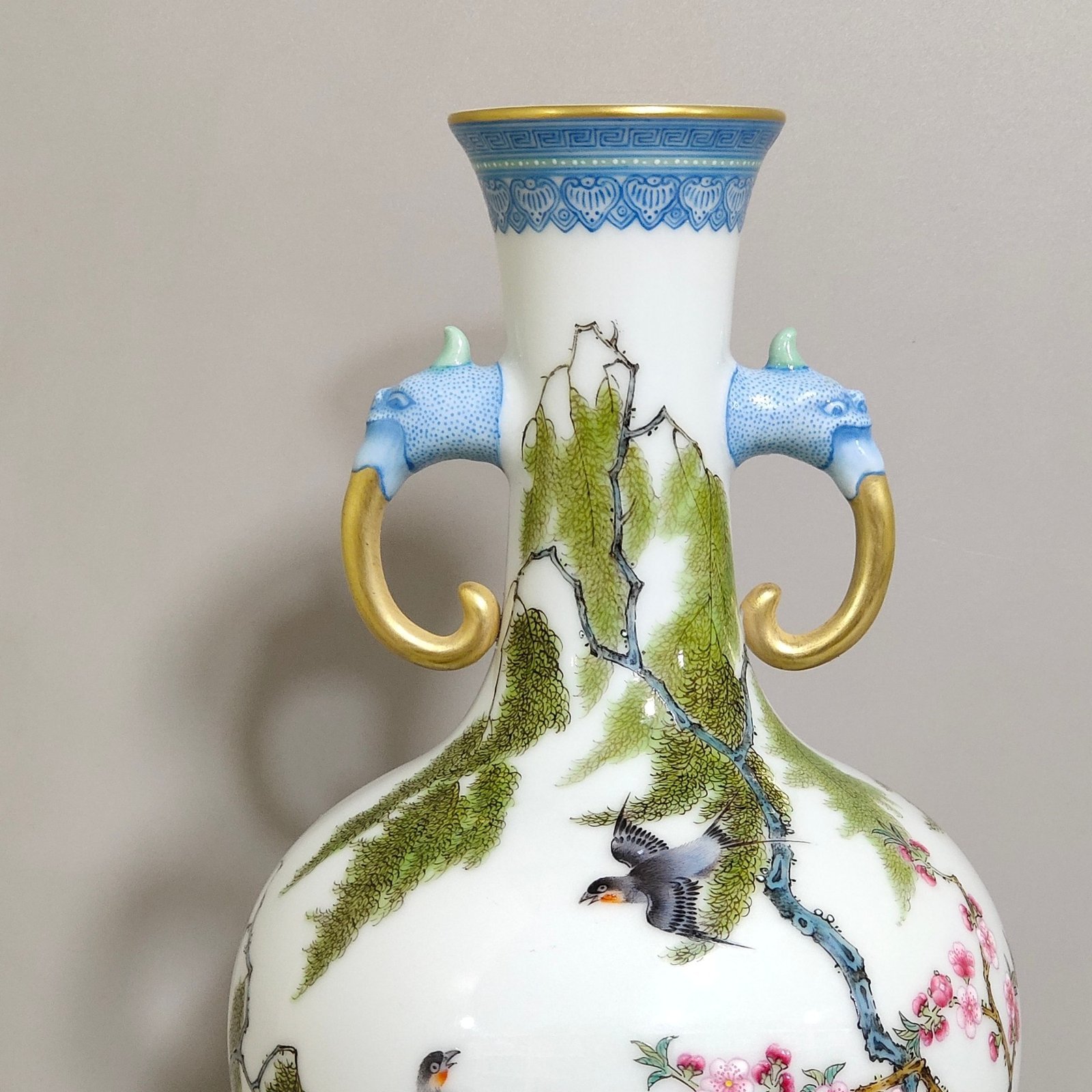 Qing Dynasty Yongzheng green edge apricot forest Chunyan poem elephant ear vase