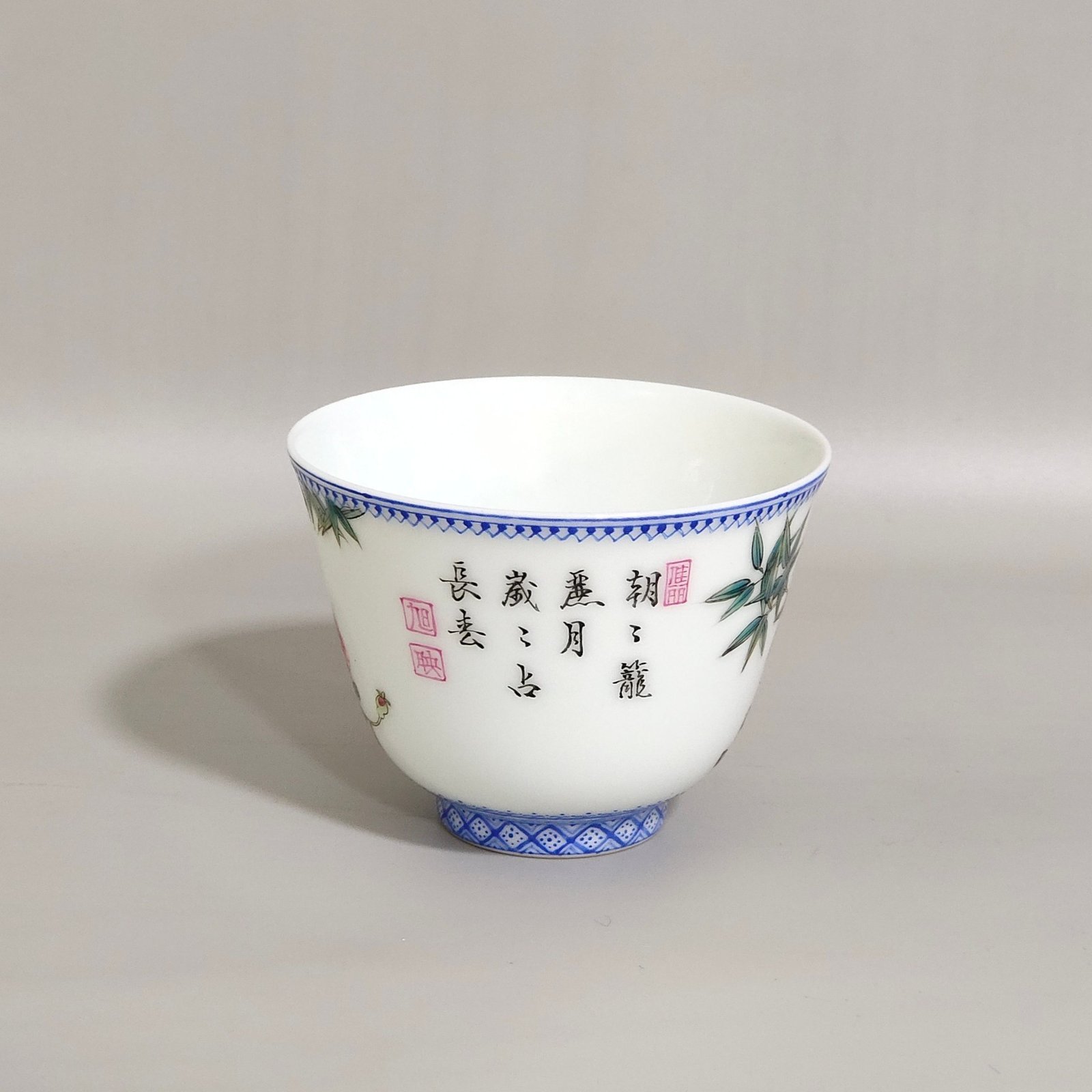 Qing Dynasty Yongzheng green bamboo border and rose flower poem cup