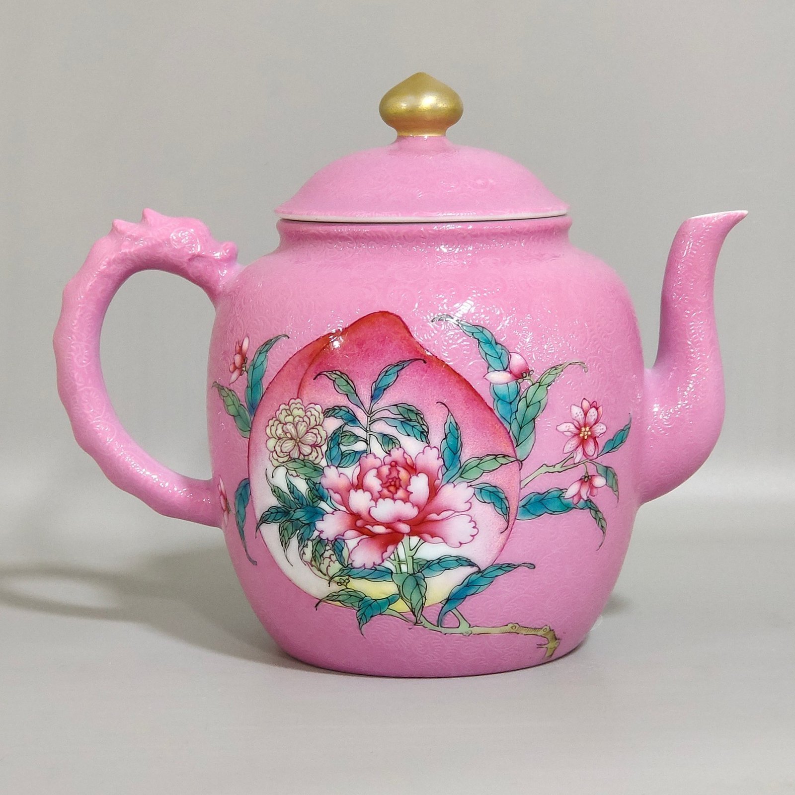 Qing Dynasty Yongzheng rouge powder grilled longevity peach flower teapot