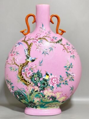 Qing Dynasty Yongzheng rouge powder carved flowers and birds holding the moon vase